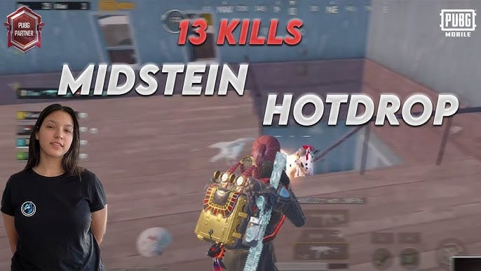 PUBG Mobile截图，显示米德斯坦热门跳点，玩家在屋顶上战斗